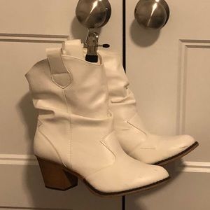 White heeled boot